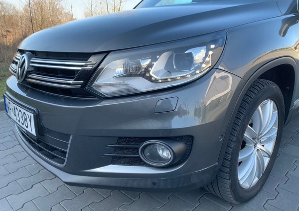 Volkswagen Tiguan cena 50950 przebieg: 206372, rok produkcji 2014 z Warszawa małe 79
